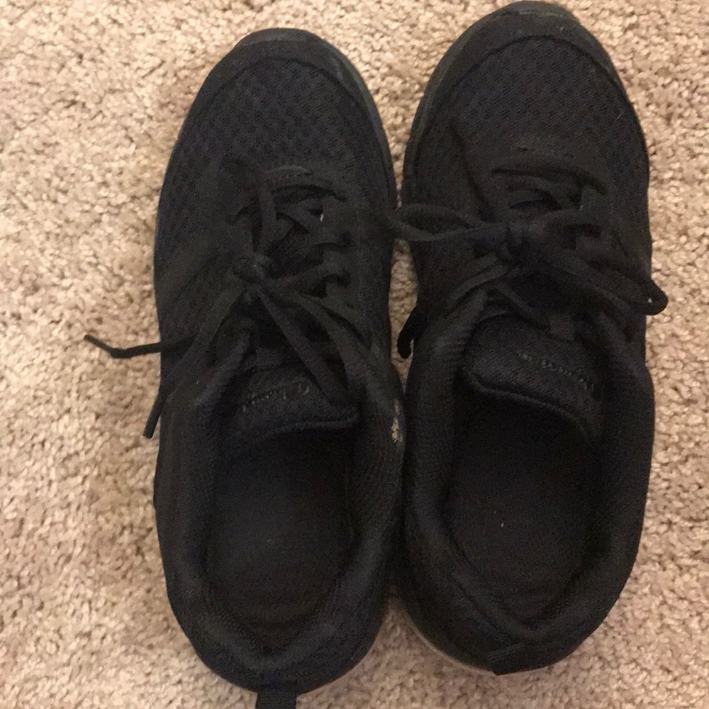 All black Champion gym shoes